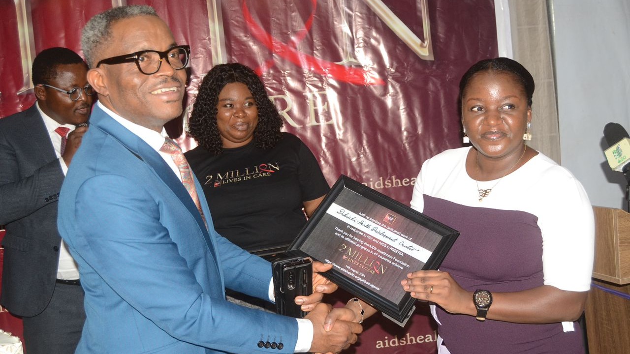 DHDC team receiving recognition during AHF milestone event.
